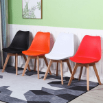 modern padded Eames chair, padded Eames dining chair, Eames style padded chair, modern Eames office chair, comfortable padded Eames seat, Eames inspired padded chair, ergonomic padded Eames chair, modern dining chair with padding, cushioned Eames chair, mid-century modern padded chair, designer padded Eames chair, soft padded Eames dining seat, stylish padded Eames chair, padded plastic Eames chair, modern lounge chair padded, contemporary Eames padded chair, Eames replica padded chair, padded chair with wooden legs, cushioned Eames style chair, padded Eames office seat