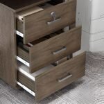 wooden mobile cabinet, rolling wood office cabinet, mobile wooden storage unit, wooden filing cabinet on wheels, portable wood cabinet, wood mobile pedestal cabinet, movable wooden drawer unit, wooden cabinet with casters, mobile wood office storage, modern wooden mobile drawer, office mobile cabinet wood finish, compact wooden cabinet on wheels, wood storage cabinet with wheels, wooden rolling drawer unit, mobile wood credenza, mobile office pedestal wood design, small wooden mobile cabinet, wooden cabinet with lock and wheels, versatile mobile wood cabinet, wheeled wooden office organizer