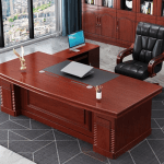 1.8M Mahogany Executive Desk, 1.8 meter executive desk, 1.8M office desk, mahogany executive desk, mahogany office desk, large executive desk, executive desk Kenya, executive desk Nairobi, office desk Kenya, office desk Nairobi, luxury executive desk, high-end executive desk, solid wood executive desk, mahogany office furniture, classic executive desk, traditional executive desk, modern executive desk, office furniture Kenya, office furniture Nairobi, executive office furniture, executive table, manager’s desk, director’s desk, CEO office desk, executive office setup, office workstation, spacious executive desk, large office desk, professional office desk, ergonomic executive desk, office desk with drawers, office desk with storage, executive desk with pedestal, office desk with side cabinet, executive desk with return, office desk with file drawers, lockable executive desk, solid mahogany desk, executive wooden desk, premium executive desk, luxury office furniture Kenya, office furniture supplier Nairobi, office furniture retailer Kenya, office interior furniture, executive office workstation, corporate office furniture, modern office furniture, office workstation desk, executive workstation furniture, high-quality executive desk, executive furniture set, professional executive workspace, corporate workspace desk, business office desk, modern executive workstation, office table Kenya, executive office furniture Kenya, office interior Nairobi, buy executive desk Nairobi, order executive desk Kenya, custom executive furniture, custom office desk Kenya, modern corporate furniture Kenya, office design Kenya, corporate furniture Nairobi, office workstation supplier Kenya, large workspace desk, spacious office table, modular executive desk, modern L-shaped executive desk, modern U-shaped executive desk, office corner desk, office corner workstation, director desk design, office manager desk, executive office setup Nairobi, premium office desk, contemporary office workstation, high-performance office desk, functional executive desk, stylish executive desk, elegant office desk