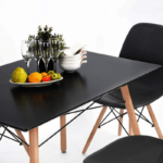 black Eames dining chair, Eames style chair, modern dining chair, black modern chair, Eames replica chair, stylish dining chair, contemporary dining chair, black kitchen chair, mid-century dining chair, designer dining chair, Eames inspired chair, black living room chair, modern home chair, comfortable dining chair, black plastic chair, Eames office chair, dining room seating, minimalist dining chair, black accent chair, modern replica chair, Eames dining replica, trendy dining chair, black café chair, sleek dining chair, Eames side chair, designer home chair, black restaurant chair, modern dining seating, black chair for kitchen, elegant dining chair