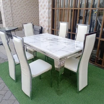 6-seater marble-top dining table, marble dining table, 6-person dining table, modern marble dining table, contemporary dining table, luxury dining table, marble tabletop dining table, dining table with marble top, solid marble dining table, rectangular marble dining table, round marble dining table, oval marble dining table, white marble dining table, black marble dining table, grey marble dining table, marble dining table with metal legs, marble dining table with wooden legs, marble dining table with steel frame, marble dining table with glass accents, minimalist marble dining table, sleek marble dining table, elegant marble dining table, designer marble dining table, premium dining table, luxury home dining table, modern home dining table, contemporary home dining table, stylish dining table, marble dining table set, 6-seater dining table set, marble dining table for kitchen, marble dining table for living room, compact marble dining table, large marble dining table, solid wood and marble dining table, marble dining table with chairs, marble dining table with bench, heavy duty marble dining table, sturdy marble dining table, commercial grade marble dining table, hotel dining table, restaurant dining table, cafe marble dining table, marble dining table for home, marble dining table for apartment, marble dining table for villa, family size dining table, 6-seater dining set, marble top table with pedestal base, marble dining table with trestle base, marble dining table with storage, marble dining table with drawers, easy clean marble table, heat resistant marble dining table, scratch resistant marble dining table, anti stain marble dining table, marble dining table with polished finish, matte finish marble dining table, natural stone dining table, premium stone dining table, high end marble dining table, classic marble dining table, contemporary marble dining room furniture, modern dining room table, stylish dining table for 6, compact dining set, multifunction dining table, marble center table dining, minimalist home dining table, marble tabletop furniture, elegant home dining solution, space saving dining table, versatile marble dining table, solid marble slab dining table, luxury marble furniture, marble table with wooden frame, marble table with metal frame, home decor dining table, sleek marble tabletop dining, durable marble dining table, high quality marble table, professional home dining furniture, marble kitchen dining table, contemporary minimalist marble table, luxury dining furniture, statement marble dining table, marble dining table for gatherings, home entertaining dining table, modern living and dining table, classic stone dining table, heavy marble dining table, premium marble dining furniture, designer home dining table, marble dining table with seating, rectangular 6-seater marble dining table, round 6-seater marble dining table, oval 6-seater marble dining table, marble dining table with sturdy base, compact 6-seater marble table, modern marble dining set, home dining room marble table, luxury marble tabletop furniture, marble dining table for family meals, sleek contemporary marble dining table, elegant stone top dining table, minimalist marble top dining table, heavy duty home dining table, solid natural marble dining table, high polished marble table, home decor marble dining furniture, versatile stone top dining table, marble dining table for open space, luxury living room dining table, designer marble dining furniture.
