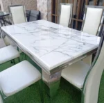 6-seater marble-top dining table, marble dining table, 6-person dining table, modern marble dining table, contemporary dining table, luxury dining table, marble tabletop dining table, dining table with marble top, solid marble dining table, rectangular marble dining table, round marble dining table, oval marble dining table, white marble dining table, black marble dining table, grey marble dining table, marble dining table with metal legs, marble dining table with wooden legs, marble dining table with steel frame, marble dining table with glass accents, minimalist marble dining table, sleek marble dining table, elegant marble dining table, designer marble dining table, premium dining table, luxury home dining table, modern home dining table, contemporary home dining table, stylish dining table, marble dining table set, 6-seater dining table set, marble dining table for kitchen, marble dining table for living room, compact marble dining table, large marble dining table, solid wood and marble dining table, marble dining table with chairs, marble dining table with bench, heavy duty marble dining table, sturdy marble dining table, commercial grade marble dining table, hotel dining table, restaurant dining table, cafe marble dining table, marble dining table for home, marble dining table for apartment, marble dining table for villa, family size dining table, 6-seater dining set, marble top table with pedestal base, marble dining table with trestle base, marble dining table with storage, marble dining table with drawers, easy clean marble table, heat resistant marble dining table, scratch resistant marble dining table, anti stain marble dining table, marble dining table with polished finish, matte finish marble dining table, natural stone dining table, premium stone dining table, high end marble dining table, classic marble dining table, contemporary marble dining room furniture, modern dining room table, stylish dining table for 6, compact dining set, multifunction dining table, marble center table dining, minimalist home dining table, marble tabletop furniture, elegant home dining solution, space saving dining table, versatile marble dining table, solid marble slab dining table, luxury marble furniture, marble table with wooden frame, marble table with metal frame, home decor dining table, sleek marble tabletop dining, durable marble dining table, high quality marble table, professional home dining furniture, marble kitchen dining table, contemporary minimalist marble table, luxury dining furniture, statement marble dining table, marble dining table for gatherings, home entertaining dining table, modern living and dining table, classic stone dining table, heavy marble dining table, premium marble dining furniture, designer home dining table, marble dining table with seating, rectangular 6-seater marble dining table, round 6-seater marble dining table, oval 6-seater marble dining table, marble dining table with sturdy base, compact 6-seater marble table, modern marble dining set, home dining room marble table, luxury marble tabletop furniture, marble dining table for family meals, sleek contemporary marble dining table, elegant stone top dining table, minimalist marble top dining table, heavy duty home dining table, solid natural marble dining table, high polished marble table, home decor marble dining furniture, versatile stone top dining table, marble dining table for open space, luxury living room dining table, designer marble dining furniture.