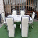 6-seater marble-top dining table, marble dining table, 6-person dining table, modern marble dining table, contemporary dining table, luxury dining table, marble tabletop dining table, dining table with marble top, solid marble dining table, rectangular marble dining table, round marble dining table, oval marble dining table, white marble dining table, black marble dining table, grey marble dining table, marble dining table with metal legs, marble dining table with wooden legs, marble dining table with steel frame, marble dining table with glass accents, minimalist marble dining table, sleek marble dining table, elegant marble dining table, designer marble dining table, premium dining table, luxury home dining table, modern home dining table, contemporary home dining table, stylish dining table, marble dining table set, 6-seater dining table set, marble dining table for kitchen, marble dining table for living room, compact marble dining table, large marble dining table, solid wood and marble dining table, marble dining table with chairs, marble dining table with bench, heavy duty marble dining table, sturdy marble dining table, commercial grade marble dining table, hotel dining table, restaurant dining table, cafe marble dining table, marble dining table for home, marble dining table for apartment, marble dining table for villa, family size dining table, 6-seater dining set, marble top table with pedestal base, marble dining table with trestle base, marble dining table with storage, marble dining table with drawers, easy clean marble table, heat resistant marble dining table, scratch resistant marble dining table, anti stain marble dining table, marble dining table with polished finish, matte finish marble dining table, natural stone dining table, premium stone dining table, high end marble dining table, classic marble dining table, contemporary marble dining room furniture, modern dining room table, stylish dining table for 6, compact dining set, multifunction dining table, marble center table dining, minimalist home dining table, marble tabletop furniture, elegant home dining solution, space saving dining table, versatile marble dining table, solid marble slab dining table, luxury marble furniture, marble table with wooden frame, marble table with metal frame, home decor dining table, sleek marble tabletop dining, durable marble dining table, high quality marble table, professional home dining furniture, marble kitchen dining table, contemporary minimalist marble table, luxury dining furniture, statement marble dining table, marble dining table for gatherings, home entertaining dining table, modern living and dining table, classic stone dining table, heavy marble dining table, premium marble dining furniture, designer home dining table, marble dining table with seating, rectangular 6-seater marble dining table, round 6-seater marble dining table, oval 6-seater marble dining table, marble dining table with sturdy base, compact 6-seater marble table, modern marble dining set, home dining room marble table, luxury marble tabletop furniture, marble dining table for family meals, sleek contemporary marble dining table, elegant stone top dining table, minimalist marble top dining table, heavy duty home dining table, solid natural marble dining table, high polished marble table, home decor marble dining furniture, versatile stone top dining table, marble dining table for open space, luxury living room dining table, designer marble dining furniture.