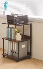 office printer stand, printer stand, office printer table, printer desk stand, printer storage stand, printer rack, office storage stand, multifunction printer stand, printer trolley stand, wooden printer stand, metal printer stand, mobile printer stand, printer cart with wheels, compact printer stand, modern printer stand, heavy duty printer stand, printer shelf unit, office printer shelf, printer workstation stand, small printer table, large printer stand, laser printer stand, inkjet printer stand, multifunctional office stand, printer cabinet stand, printer organizer stand, printer desk shelf, printer stand with drawers, printer stand with storage, printer stand with cabinet, printer stand with wheels, printer stand for home office, office equipment stand, office printer organizer, printer support stand, printer side table, under desk printer stand, freestanding printer stand, office printer furniture, printer workstation table, printer shelf rack, printer storage rack, printer desk organizer, office printer shelf unit, space saving printer stand, durable printer stand, printer stand Kenya, printer stand Nairobi, office furniture Kenya, office printer stand Nairobi, affordable printer stand, best printer stand, modern office stand, stylish printer stand, ergonomic printer stand, office storage furniture, printer cabinet organizer, printer shelf cabinet, printer stand with shelves, 2 tier printer stand, 3 tier printer stand, adjustable printer stand, printer stand for small spaces, compact office stand, printer stand for businesses, printer stand for schools, printer stand for offices, printer stand for home, printer stand design, printer stand ideas, printer stand furniture, office shelf for printer, printer stand online Kenya, buy printer stand Nairobi, quality printer stand, office printer desk furniture, printer stand accessories, printer stand solution, office equipment furniture, printer holder stand, printer station stand, printer desk unit, printer table with storage, printer table organizer, printer stand for desktop, office desk printer stand, printer rack organizer, office printer rack unit, printer stand for copier, copier printer stand, office copier stand, multipurpose office stand, office printer support table, compact printer table, printer workstation organizer, printer stand for business office, printer stand for corporate office,
